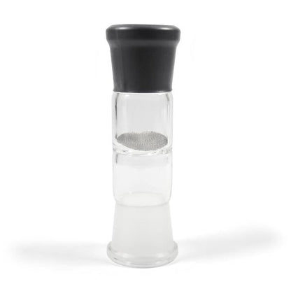 a glass pepper mill with a black top
